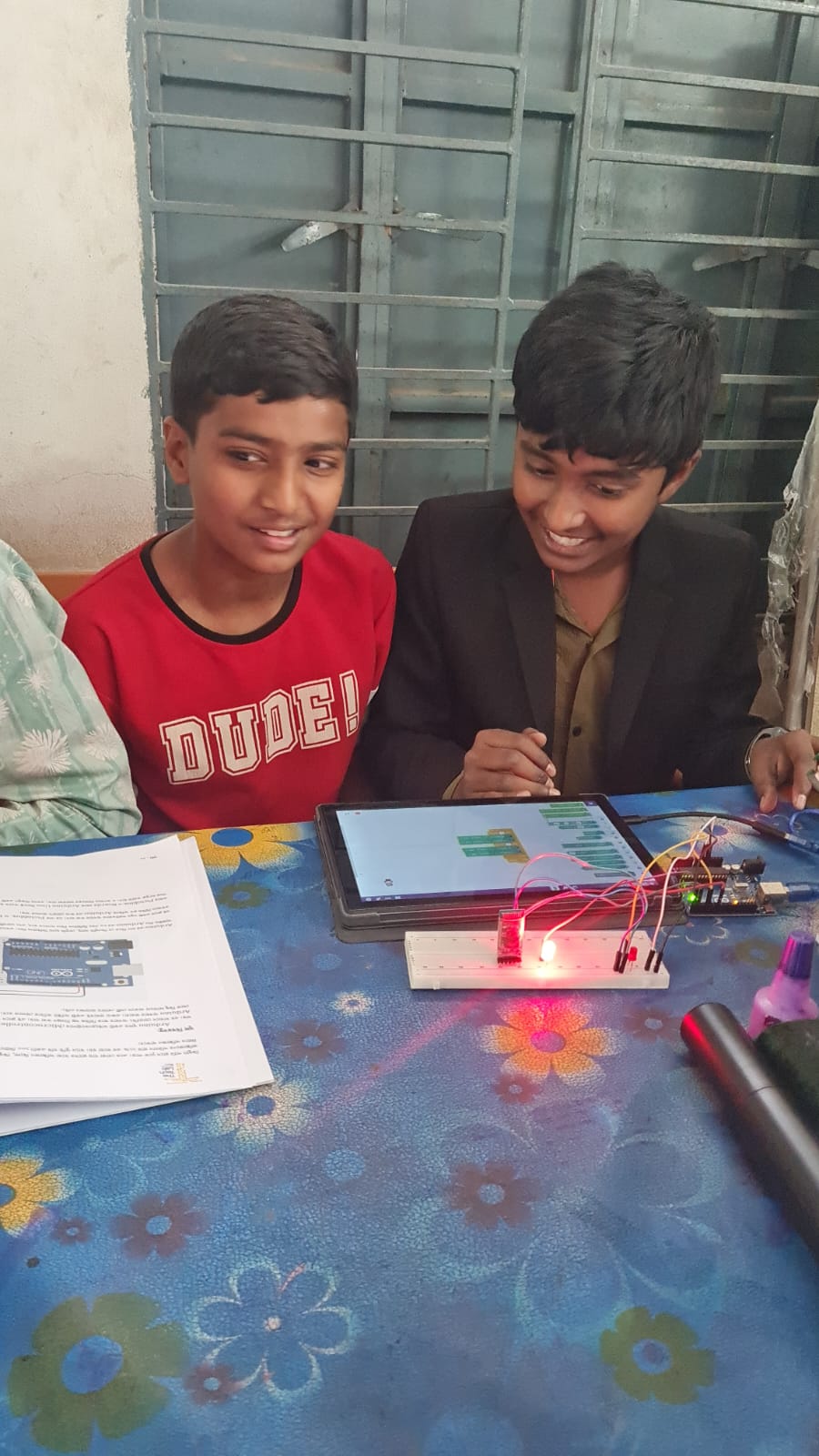 Oporajita — children with robotics kit